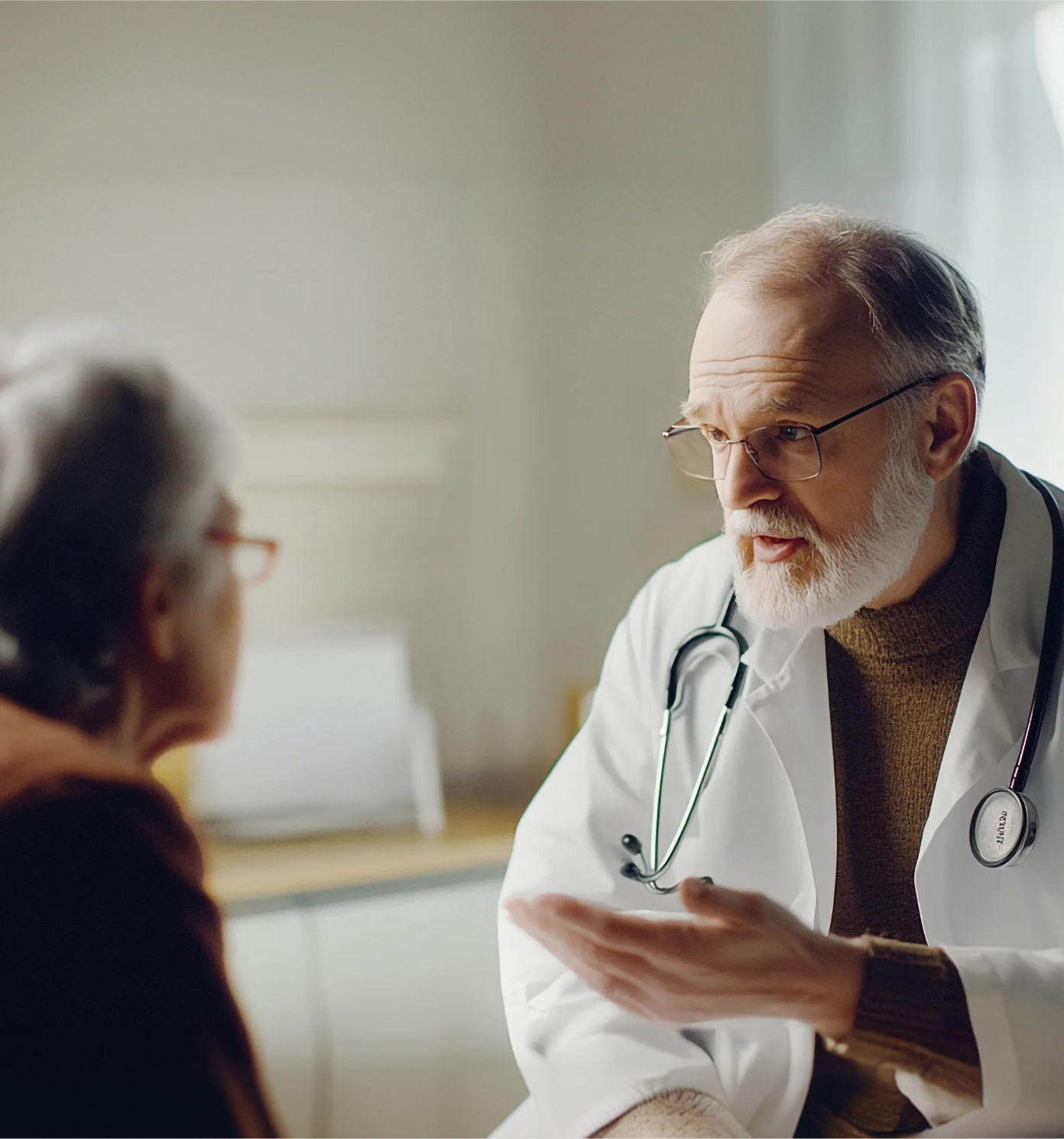 Dermatologist consulting with a patient about photodynamic therapy treatment.